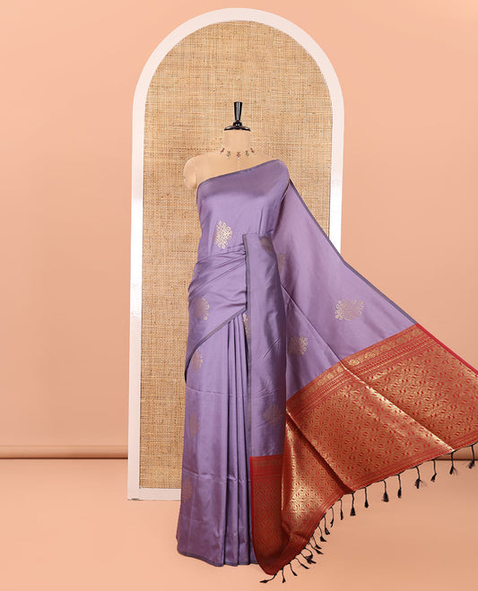 Borderless Lavender Semi-Soft Silk Saree, Accentuated with Kolam Zari Buttas All Over Its Body, Complemented by a Contrast Grandly Woven Pallu of Jaal Designs, and Paired with a Contrast Blouse