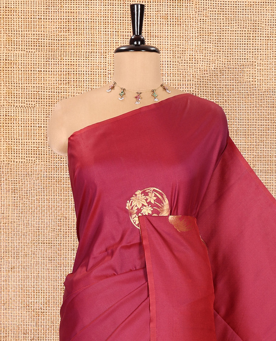 Borderless Maroon Semi-Soft Silk Saree Elevated with Bird-Floral Buttas All Over Its Body, Complemented by a Contrast Intricately Designed Pallu, and Paired with a Contrast Plain Blouse