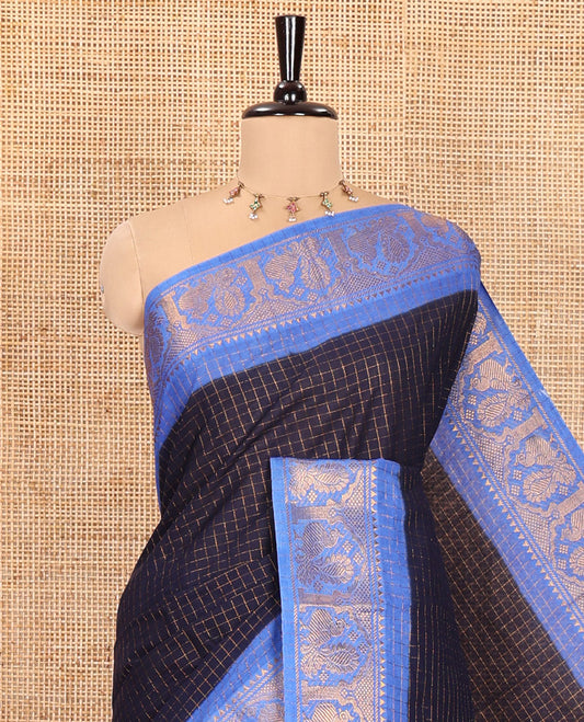 Blue and Royal Blue Sungudi Cotton Saree, Subtly Sparkled with Checks on Its Body, Complemented by a Contrast Temple Border of Peacock Motifs, Pallu Steeped with Stripes, and Paired with a Contrast Blouse