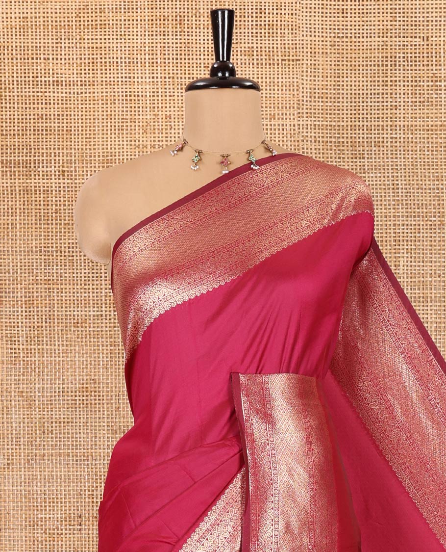 Pink Plain Semi-Soft Silk Saree, Elevated with Traditional Zari Designs Woven Border, Grandly Woven Pallu Steeped with Chakram Designs, and Paired with a Matching Blouse