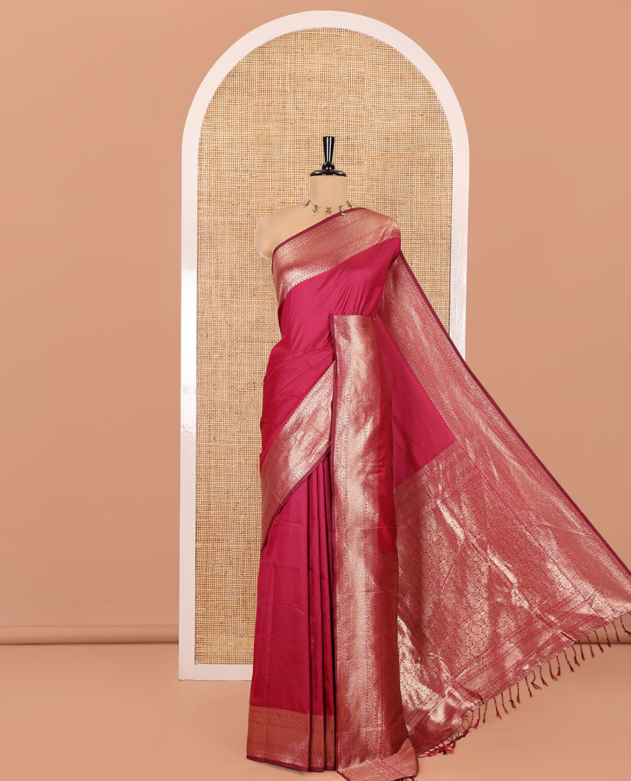 Pink Plain Semi-Soft Silk Saree, Elevated with Traditional Zari Designs Woven Border, Grandly Woven Pallu Steeped with Chakram Designs, and Paired with a Matching Blouse