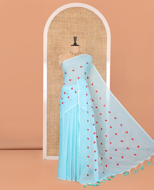 Borderless Sky Blue Khadi Mul Cotton Saree, Artfully Designed with Heart Motifs Embroidery Across Its Body, Pallu mirrors the Same Design, and Paired with a Matching Blouse