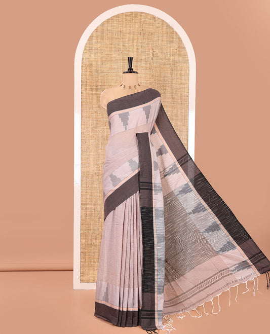 Light Brown Plain Khadi Mul Cotton Saree, Complemented by a Contrast Temple Border, Textured Pallu of Temple Designs, and Paired with a Matching Blouse