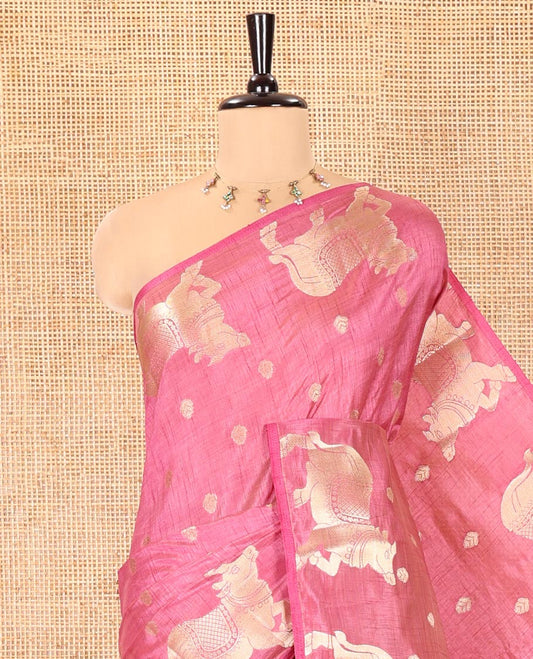 Onion Pink Art Tussar Saree, Embellished with Gold Zari Buttas All Over Its Body, Highlighted by a Zari Border of Pichwai Cow Motifs, Grandly Woven Pallu, and Paired with a Matching Blouse