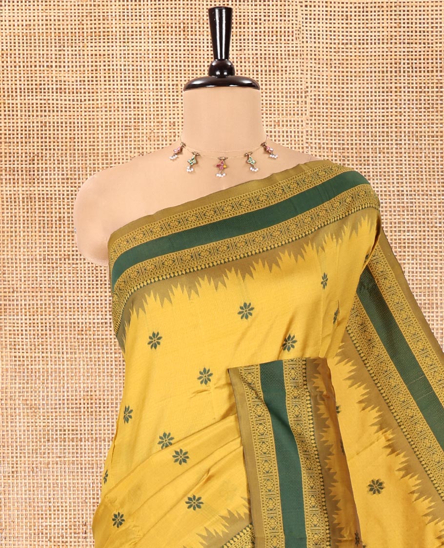 Yellow Kanchi Silk Saree, Subtly Woven with Floral Thread Buttas All Over Its Body, Complemented by a Contrast Border of Temple Traditional Motifs, Jaal Pallu, and Paired with a Matching Blouse