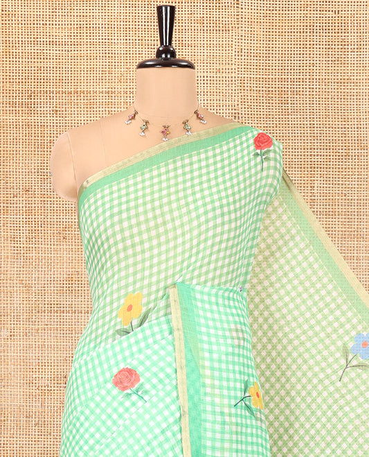 Green Linen Cotton Saree, Elevated with Micro-Checks and Floral Motifs on Its Body, Subtle Piping Border, a Self-Pallu, and Paired with a Rose Floral Printed Blouse