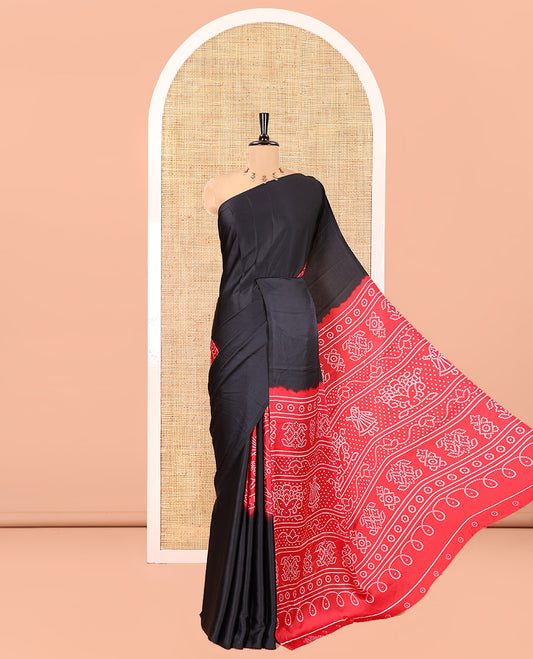 Borderless Black and Red Satin Crepe Saree, Elevated with Plain and Bandhani-Circle Print on Its Body, Intricately Bandhani Printed Pallu, and Paired with a Contrast Blouse