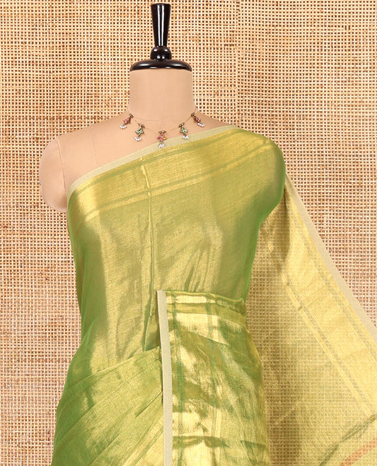 Green Plain Khadi Tissue Saree, a Gleaming Zari Bavanji Border, Golden Zari Striped Pallu, and Paired with a Matching Blouse