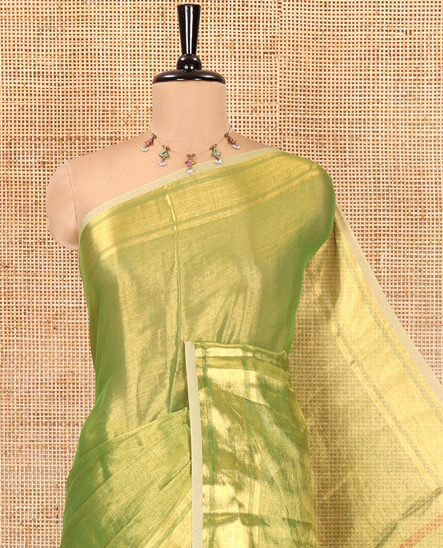 Green Plain Khadi Tissue Saree, a Gleaming Zari Bavanji Border, Golden Zari Striped Pallu, and Paired with a Matching Blouse