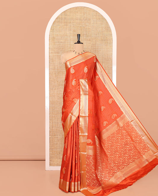 Orange Satin Silk Saree, Enriched with Paisleys and Zari Checked Design on Its Body, Highlighted by Zari Traditional Design Border, Floral Jaal Pallu, and Paired with a Matching Blouse