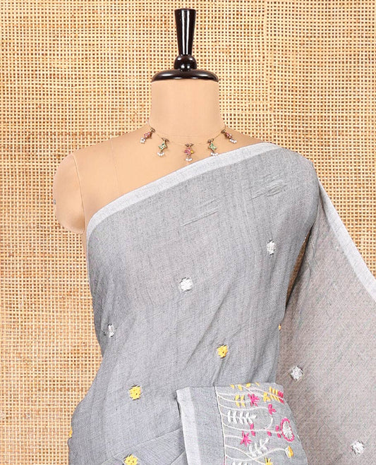 Borderless Grey Khadi Cotton Saree, Delicately Woven with Flower Motifs Embroidery All Over Its Body, a Self-Pallu, and Paired with a Matching Blouse