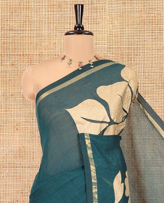 Borderless Rama Green  Khadi Mul Cotton Saree, Elevated with Big Floral Motifs on Its Body, a Self-Pallu, and Paired with a Matching Blouse