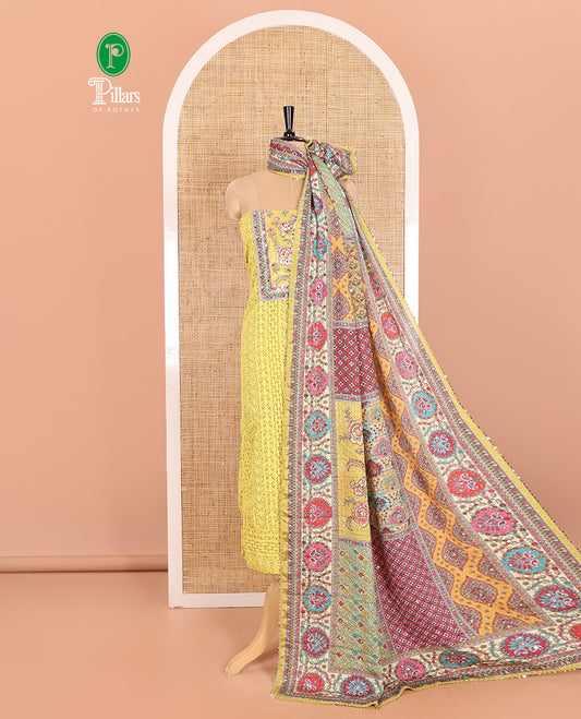 Liril Green Material Chudidar Set Adorned with Schiffli Embroidery Georgette Top, Subtly Made Plain American Crepe Bottom, and Chinon Dupatta Featuring Kaleidoscopic-Colored Floral, Geometric, and Mughal Motifs Print and Mirror Work