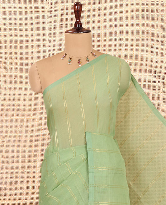 Borderless Pista Green Khadi Mul Cotton Saree, Adorned with Vertical Zari Stripes, a Self-Pallu, and No Blouse