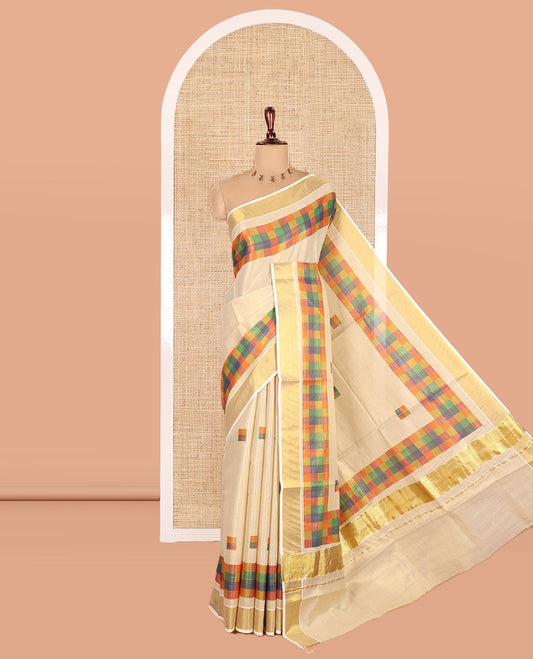 Gold-Mehendi Kerala Tissue Cotton Saree Features Madras Checked Buttas, a Zari Checked Border, and a Contrast Blouse