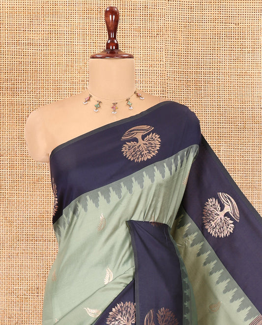 Elaichi Elite Soft Silk Saree, Decorated with Zari Buttas, a Contrast Tree Motifs Temple Border, Paithani-Style Woven Pallu, a Contrast Blouse