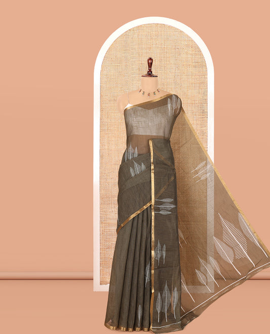 Olive Green Linen Cotton Saree Features Tree Print, a Zari Piping Border, and a Matching Blouse