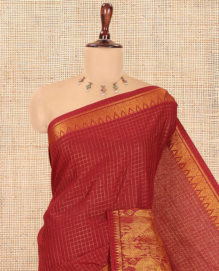 Maroon Checked Sungudi Cotton Saree, a Traditional Paisley-Peacock Zari Border, Self-Pallu, and a Contrast Blouse