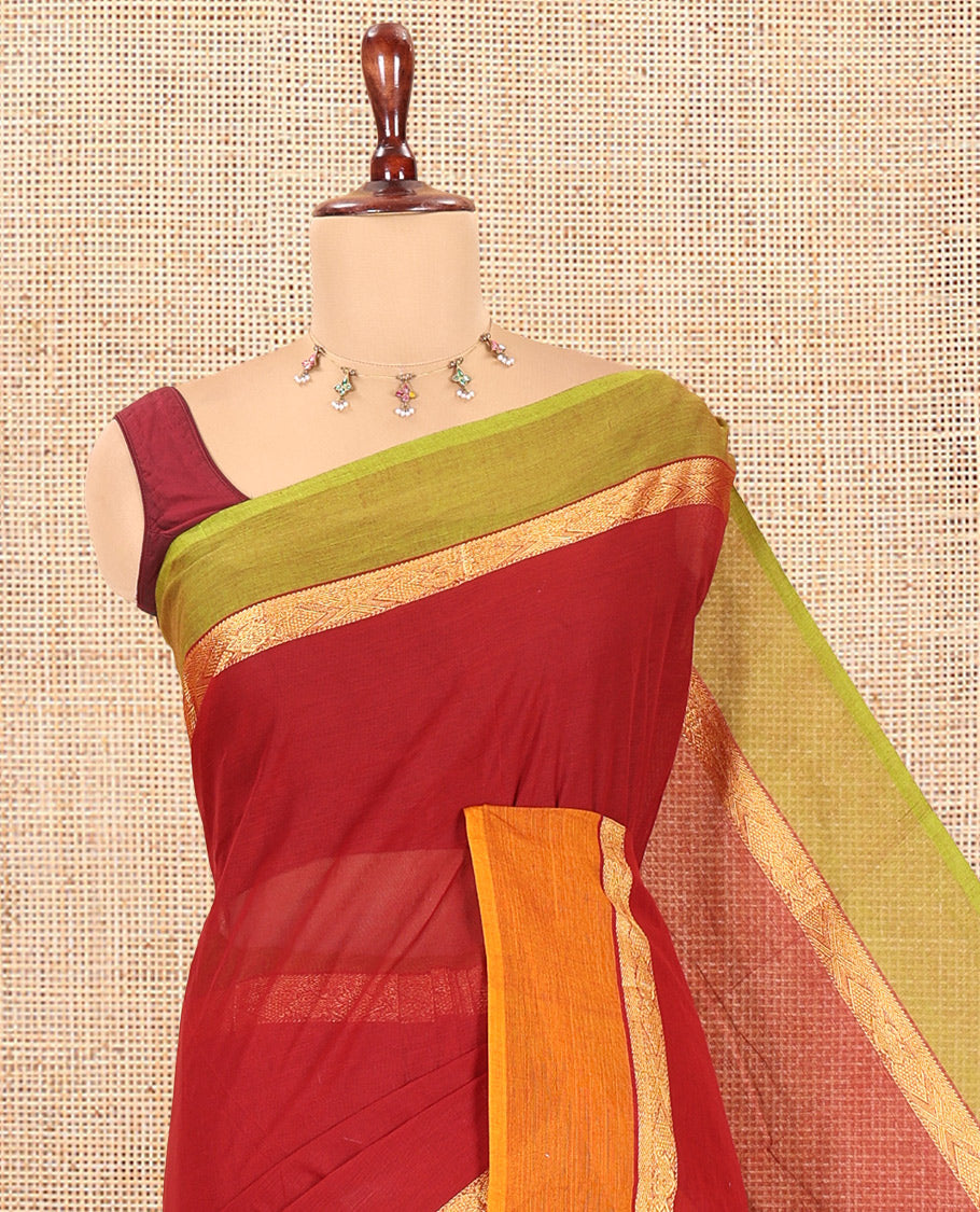 Maroon Plain Chettinad Cotton Saree, a Contrast Ganga-Jamuna Border, Striped Pallu, and a Matching Blouse