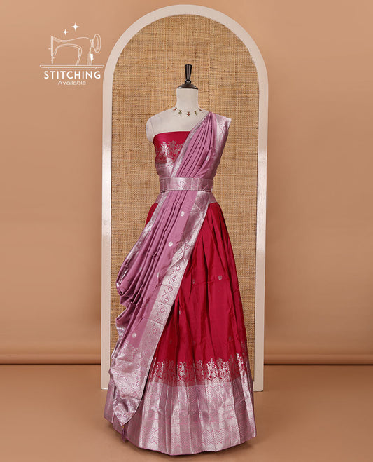 Rani pink taffeta silk half-saree, zari buttas & contrast floral-geometric zari border skirt, zari woven blouse & contrast zari woven dhavani