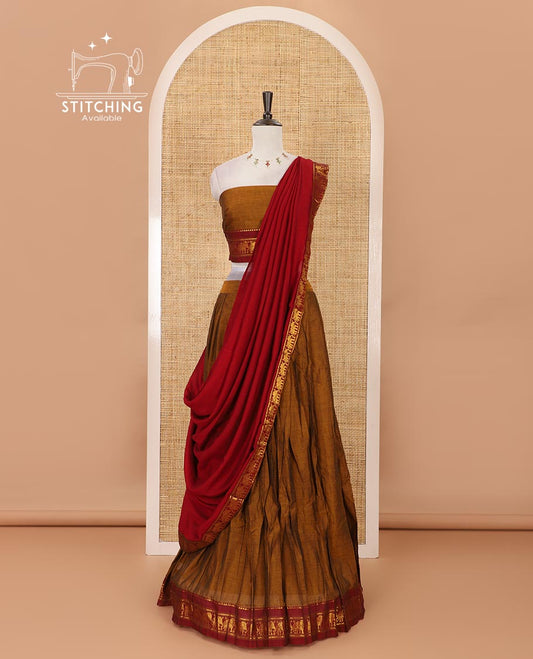 Mustard mercedised cotton half-saree, plain contrast elephant zari border skirt, matching blouse & contrast maroon zari elephant border dhavani
