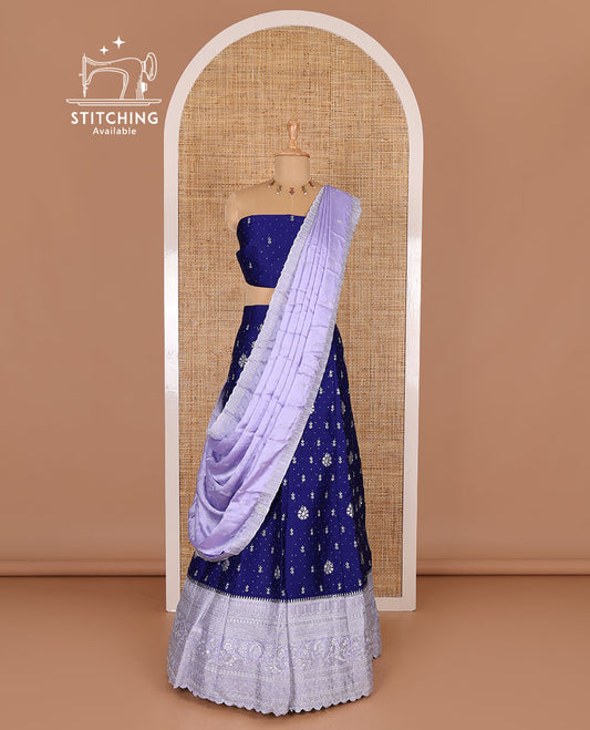 Blue half-saree, floral motifs embroidered semi-raw silk top, matching embroidered blouse, and contrast scallop embroidered georgette dhavani