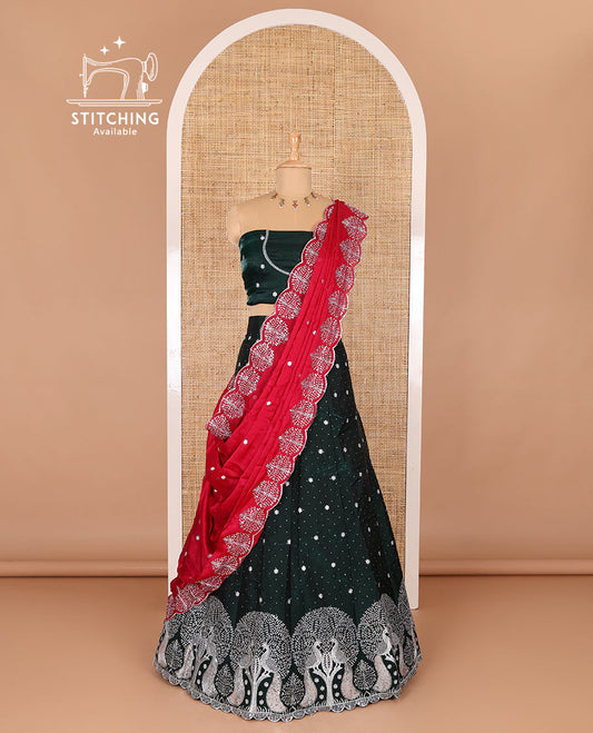 Dark green half-saree, buttas, tree, and peacock motifs embroidered semi-taffeta silk top, matching blouse, and contrast scallop embroidered dhavani