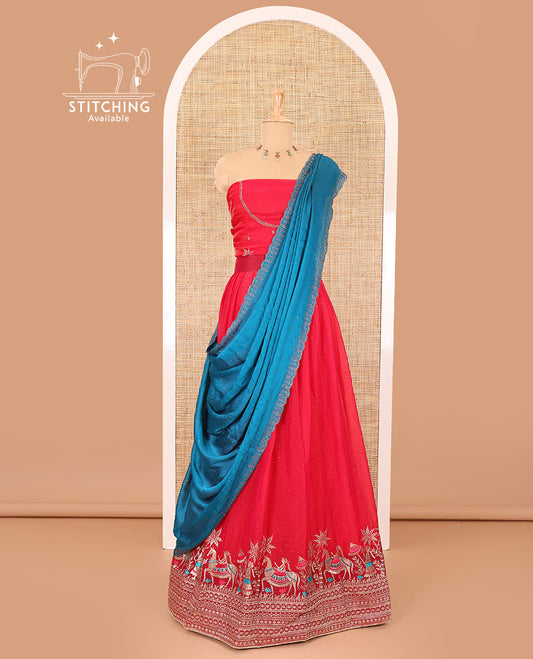 Red half-saree, Swarovski stone work with girl-on-the-horse motifs embroidered bordered satin georgette skirt, a matching satin georgette blouse, and a contrast Swarovski stone work scallop dhavani