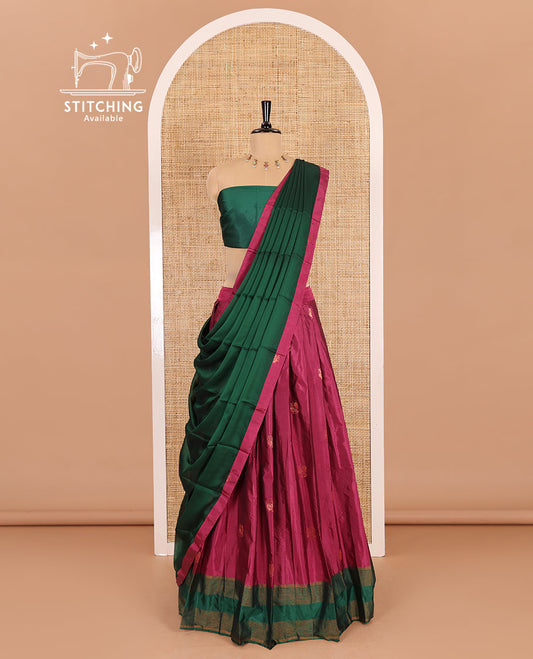 Pink and green half-saree, peacock butta with contrast bordered taffeta silk skirt, a plain blouse, and a contrast bordered syska georgette dhavani