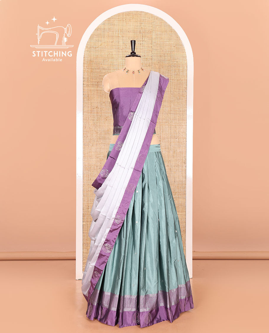 Steel grey and lavender half-saree with buttas with contrast traditional bordered taffeta silk skirt, a matching blouse, and a contrast bordered syska georgette dhavani