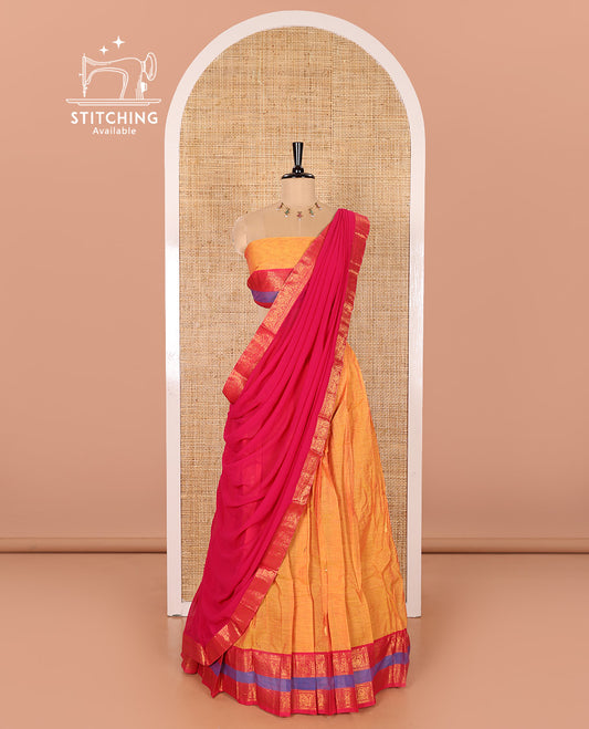Mustard and Rani Pink Chettinad Cotton Half-Saree Featuring Buttas Woven Skirt, Highlighted with a Contrast Rettai Pettu Peacock Motifs Woven Zari Border, a Subtly Woven Matching Blouse, and a Vichitra Silk Contrast Traditional Zari-Bordered Dhavani