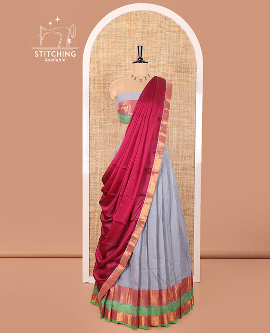 Grey and Rani Chettinad Cotton Half-Saree Featuring Plain Skirt, Adorned with a Contrast Traditional Zari Design Rettai Pettu Border of Peacock Designs, Paired with a Matching Blouse, and Contrast Satin Georgette Dhavani with Zari Border