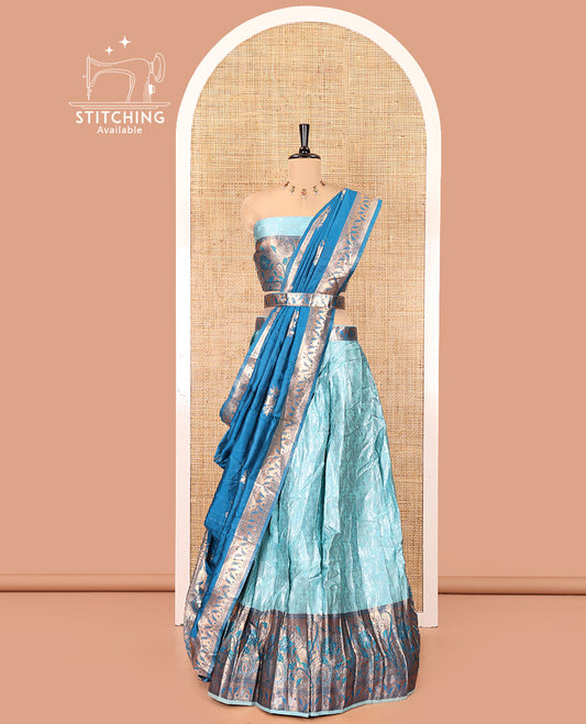 Sea Green and Peacock Green Half-Saree Set, Subtly Sparkled with Floral Vine Design on Its Banarasi Skirt, Complemented by Contrast Meenakari Floral Design with Embroidered Border, Matching Blouse, and Paired with a Banaras Dupatta