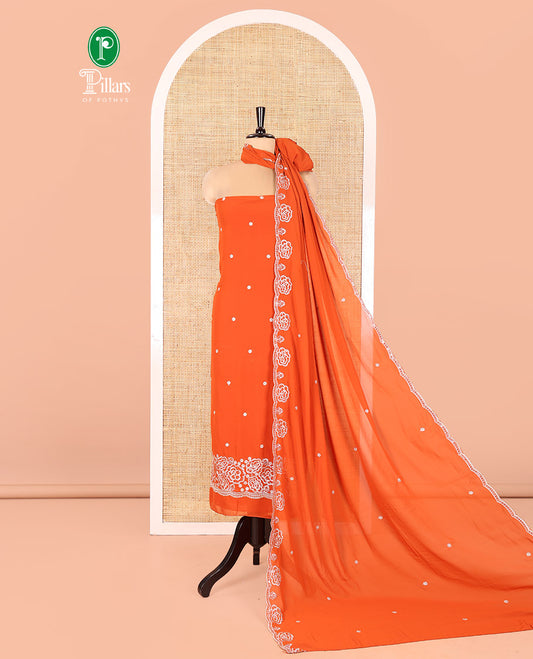 Rust Fox Georgette Material Chudidar Set, Woven with Floral Embroidery on Its Top, a Plain Santoon Bottom, and Paired with a Rose Floral Embroidered Scallop Dupatta