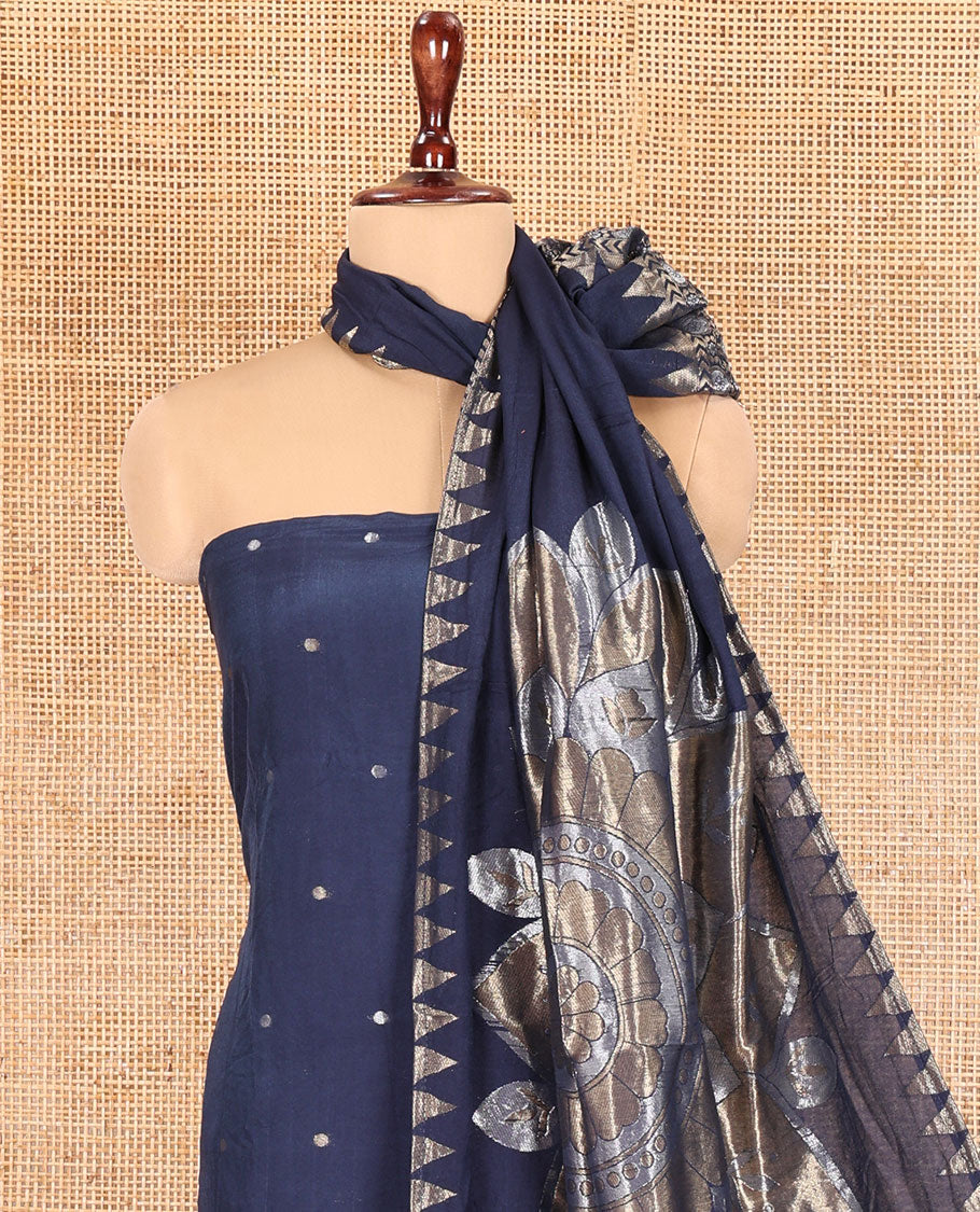 Blue Semi-Silk Material Churidar Features Zari Buttas Skirt, a Plain Bottom, and a Floral Motif Zari Woven Dupatta
