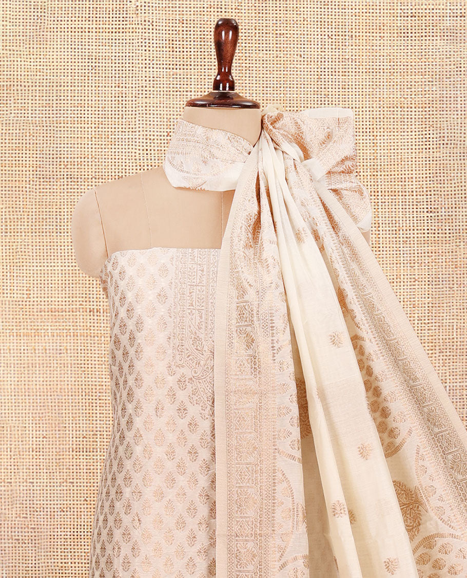 Kerala Cream Banarasi-Silk Material Churidar, Elevated with Zari Buttas Top, a Plain Bottom, and Intrircate Dhavani