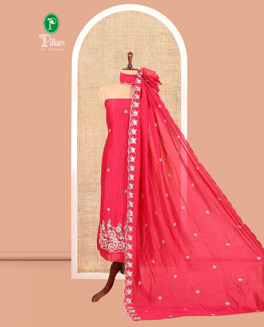 Magenta Semi-Silk Material Churidar Features a Floral Embroidered Top, a Matching Bottom, Embroidered Dupatta