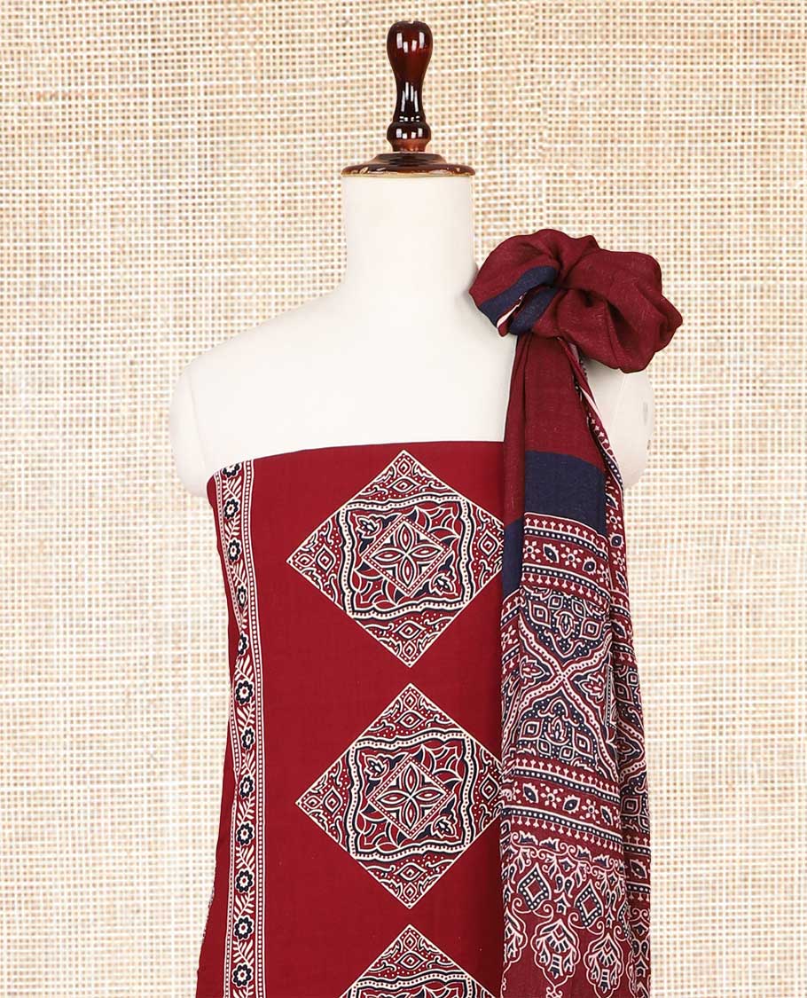 Maroon ajrak print rayon chudidhar material top with rayon material printed pant & mul mul votton ajrak printed dupatta
