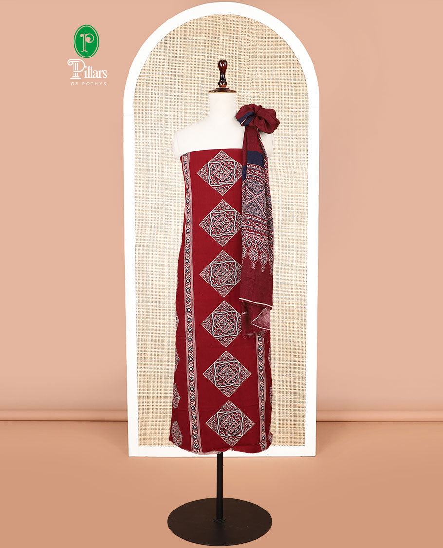Maroon ajrak print rayon chudidhar material top with rayon material printed pant & mul mul votton ajrak printed dupatta
