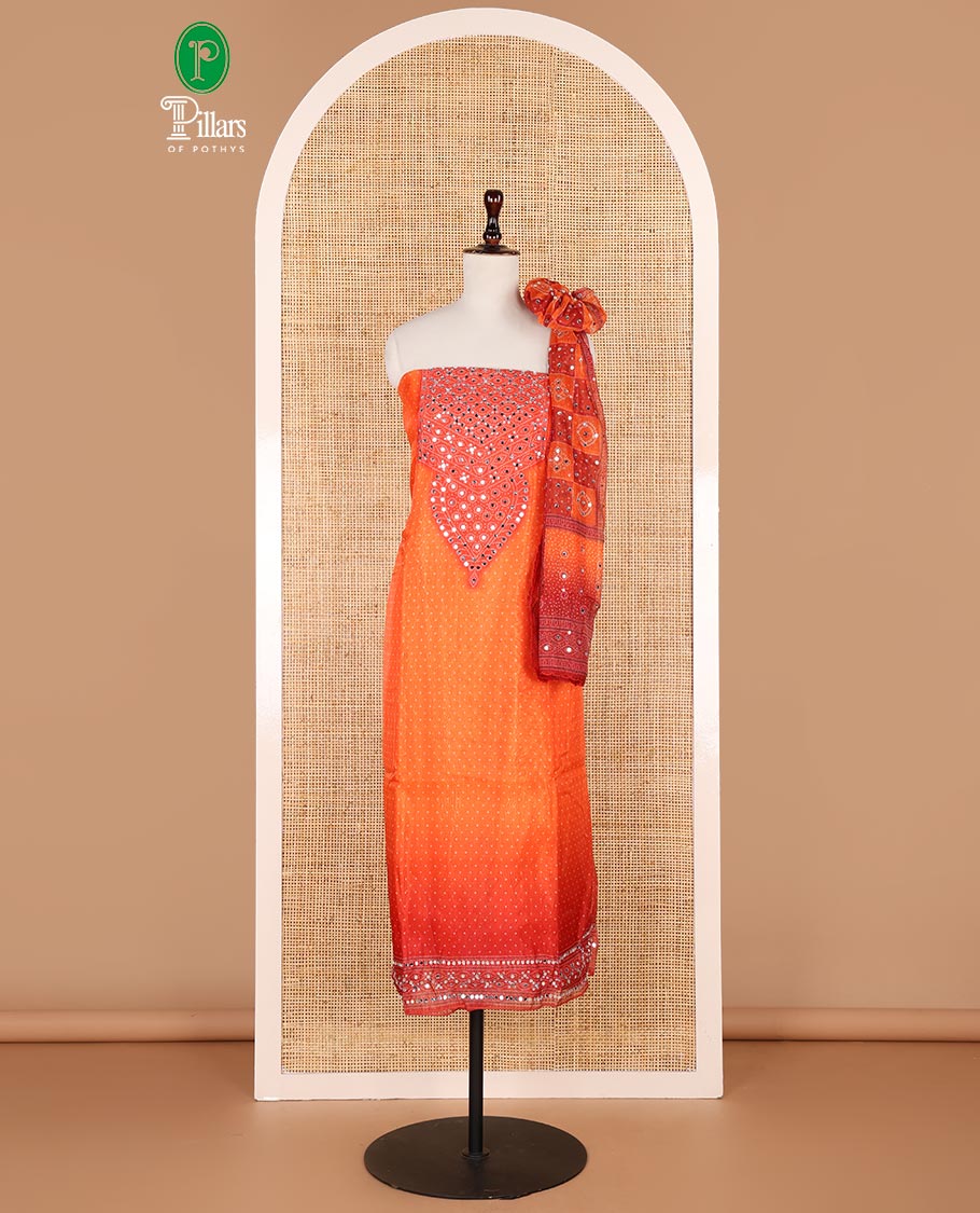 Orange double shaded bhandani print organza chudidhar material top with santoon material pant & bhandani print, mirror work dupatta