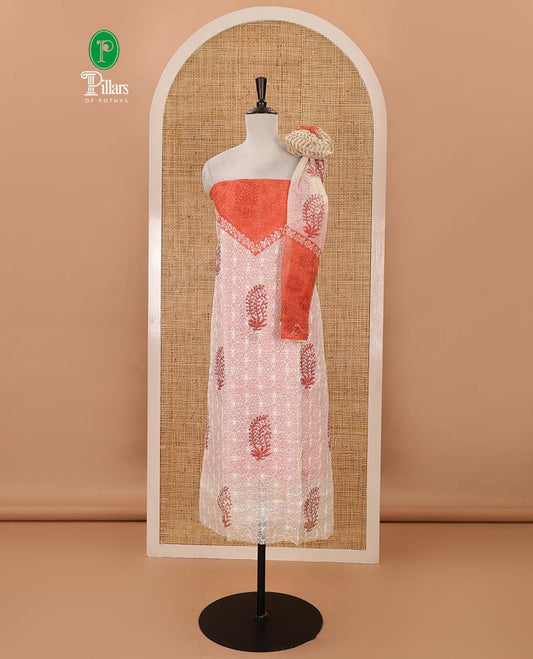 Cream-orange material chudidar set, print & chikankari-style embroidered net kota top, semi-raw silk bottom & floral print net kota dupatta