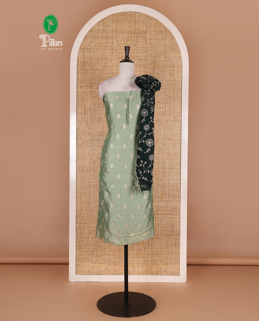 Pista green Vichitra silk material churidar set, floral motifs embroidered top, contrast Santoon bottom, and floral vine thread embroidered scallop dupatta