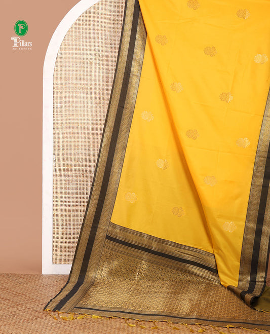 Yellow zari buttas semi-soft silk saree, contrast rettai pettu traditional zari border & grand ogee patterned pallu