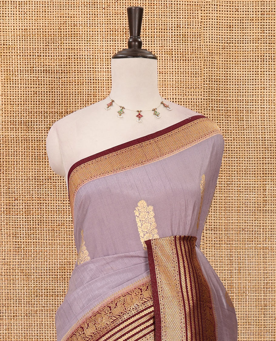 Light lavender floral zari buttas dola silk saree, contrast traditional zari peacock border, diagonal floral zari striped pallu & contrast jacquard blouse