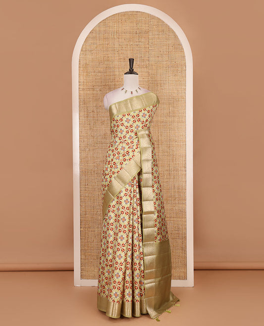 Light mehendi green patola style printed fancy tussar saree, traditional zari border, intricately zari woven pallu and printed blouse