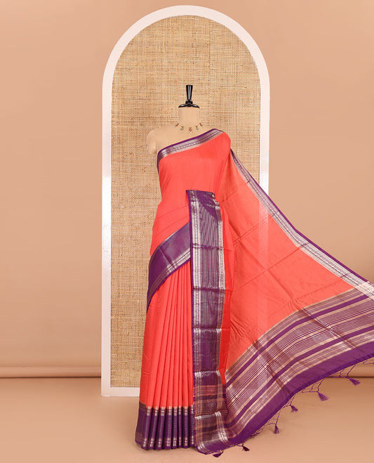 Carrot pink plain Assam silk saree, contrast traditional zari border of rudraksham motifs, zari striped pallu, and a contrast zari bordered blouse