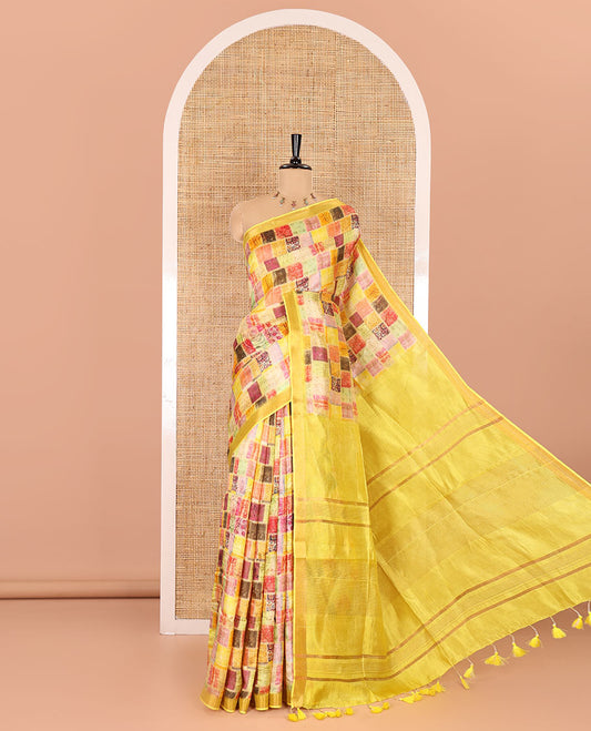 Yellow-base unique motifs enclosed colorful checks printed banana pith saree, zari striped pallu, and a matching blouse