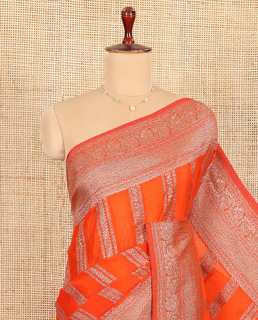 Orange Fancy Khaddi Georgette Elevated with Geometric Patterns in Zari, Subtly Woven Border Steeped with Traditional Designs, Richly Woven Pallu of Jaal Designs, and Paired with a Matching Blouse