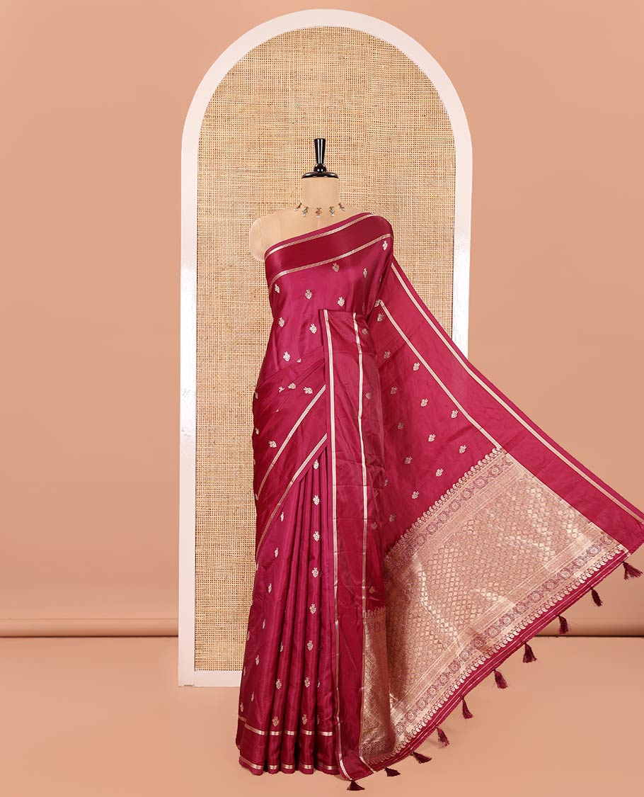 Magenta Pink Semi-Banaras Satin Silk Saree, Ornamented with Zari Buttas All Over Its Body, Highlighted by Zari Striped Border, Grand Jaal Pallu, and Paired with a Matching Blouse