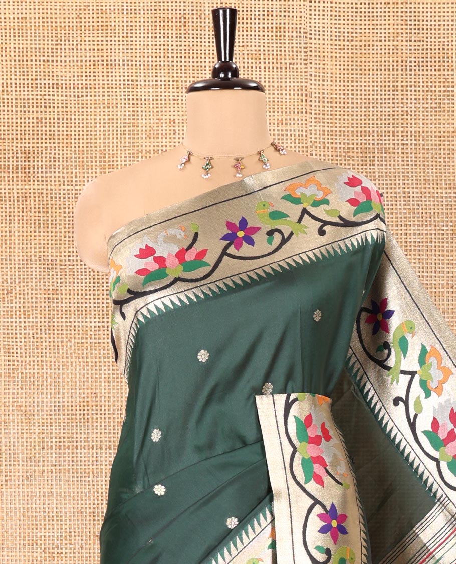 Green Paithani Art Silk Saree, Decked Up with Flower Buttas All Over Its Body, Highlighted by Zari Border Pictures Colorful Floral, and Parrot Designs, Pallu of Muniya, Floral and Parrot Designs, and Paired with a Matching Blouse